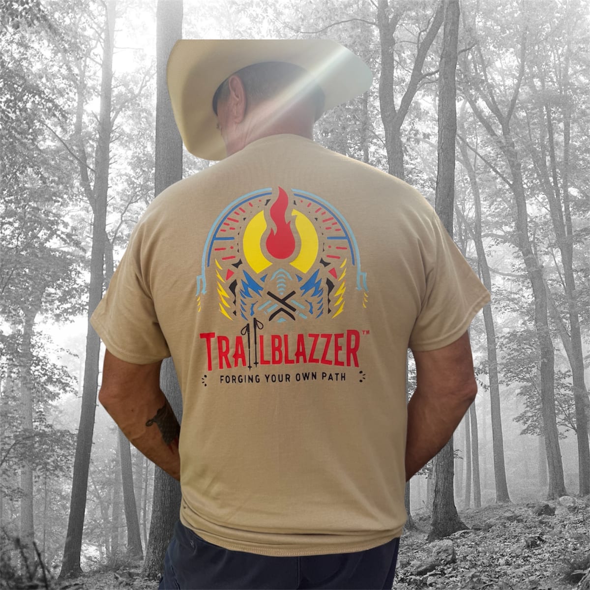 TRAIILBLAZZER outdoor apparel flatlay on weathered wood